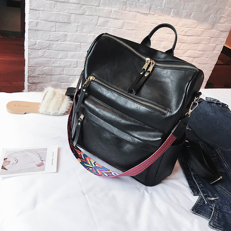 POP5 (New retro backpack college wind casual bag large capacity soft leather backpack)