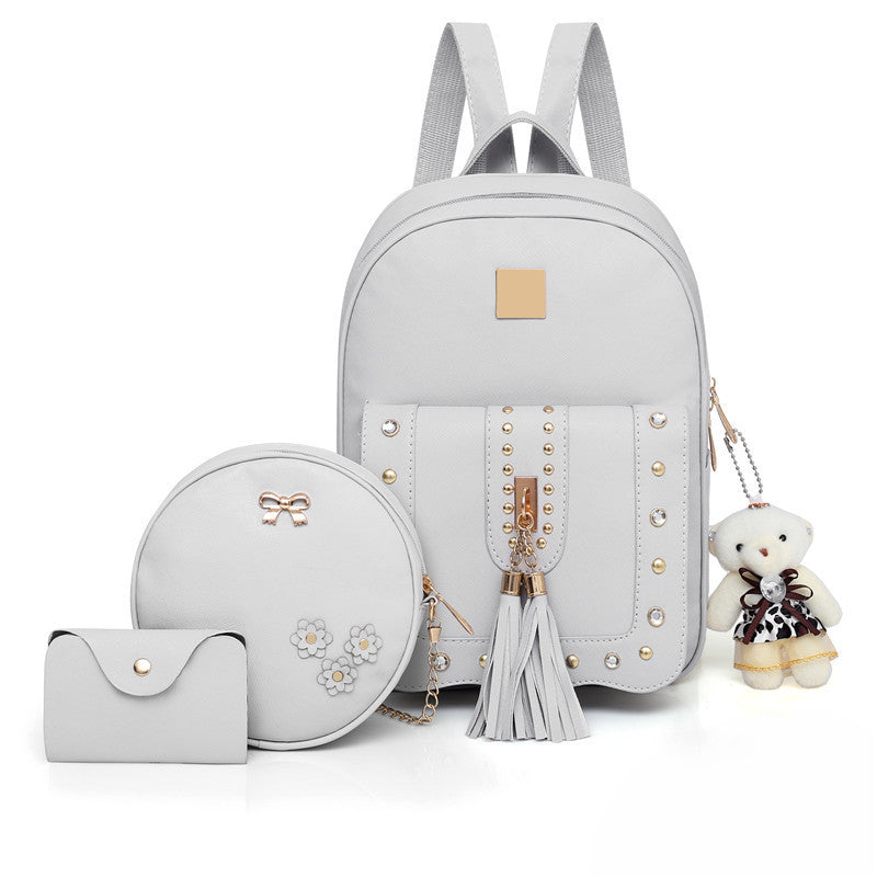 OREU12 (Women's tassel rivet backpack)
